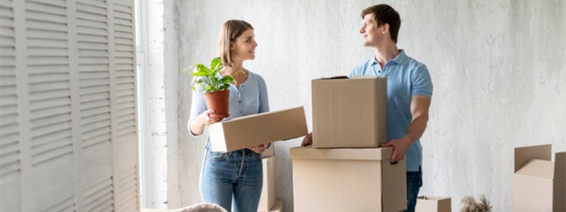 young couple preparing for a household relocation