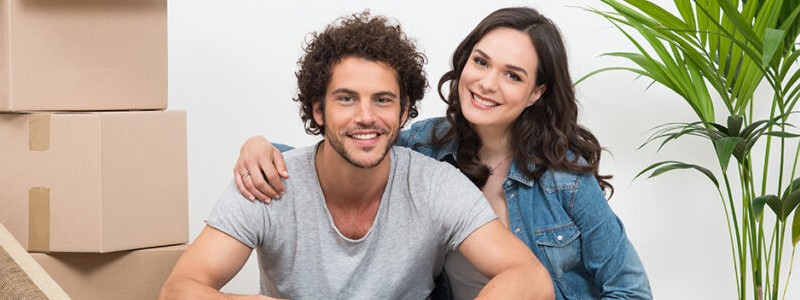 young couple into their new house