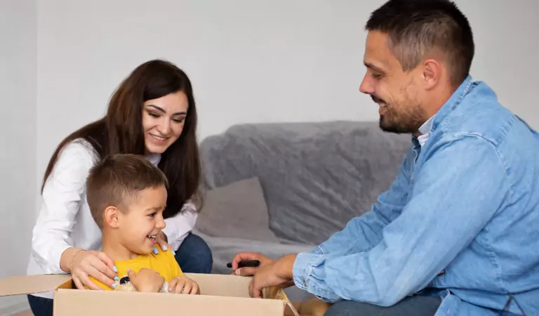 couple with their kid inside of a house