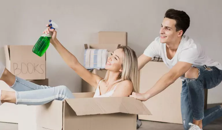 couple looking happy during the house moving process