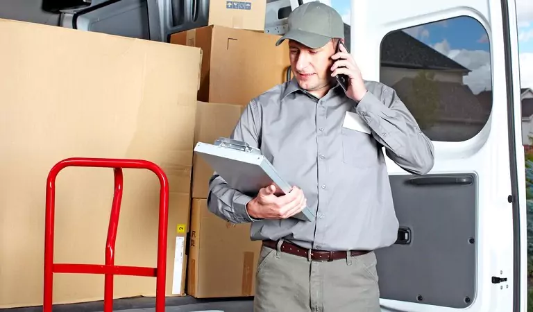 professional mover talking over a call