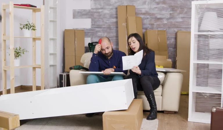 Caucasian couple arguing in a new apartment